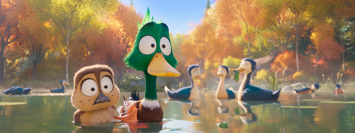 Two duck swim away from others in a promotional image for Migration.