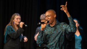 A Capella singers perform in a promotional image for Northern Lights.