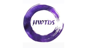 An purple circle has the initials 'HWTDS' in the centre of this standing for Helen West Theatre Dance School.