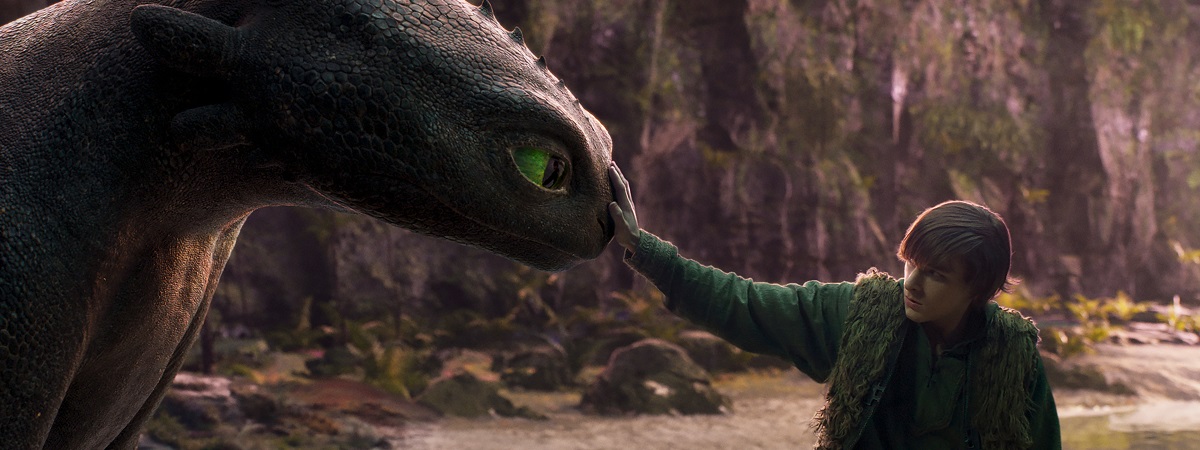 Mason Thames as Hiccup with his Night Fury dragon, Toothless, in Universal Pictures’ live-action How to Train Your Dragon.