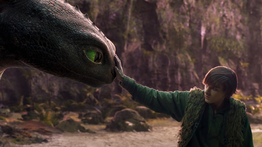 Mason Thames as Hiccup with his Night Fury dragon, Toothless, in Universal Pictures’ live-action How to Train Your Dragon.