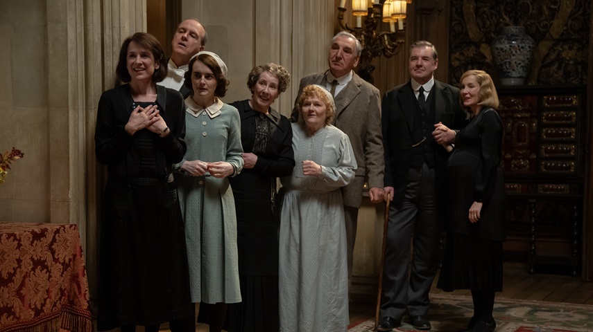 Raquel Cassidy stars as Miss Baxter, Kevin Doyle as Mr. Molesley, Sophie McShera as Daisy Parker, Phyllis Logan as Mrs. Hughes, Lesley Nicol as Mrs. Patmore, Jim Carter as Mr. Carson, Brendan Coyle as Mr. Bates and Joanne Froggatt as Anna Bates in Downton Abbey: The Grand Finale.