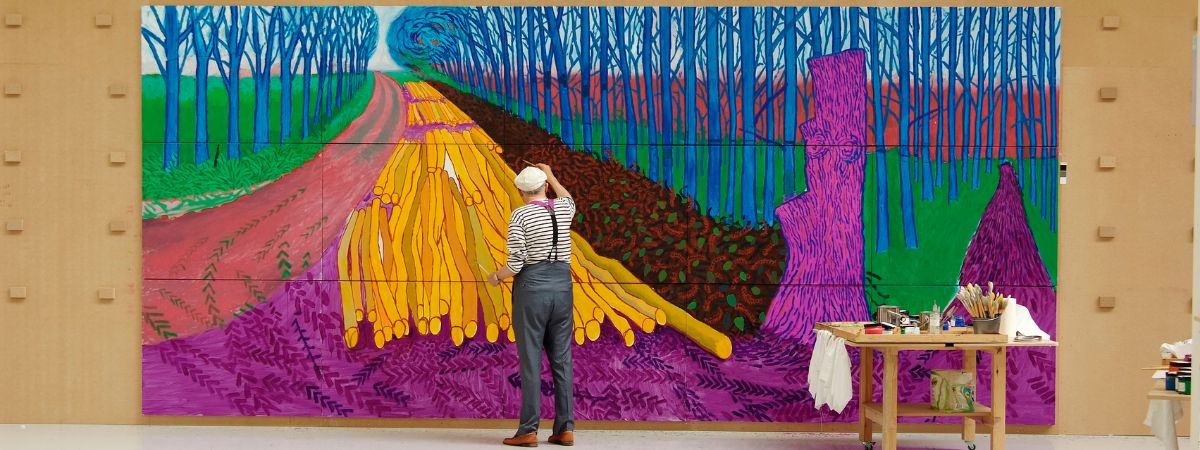 David Hockney painting Winter Timber in Bridlington, July 2009 in an image from Exhibiton On Screen: David Hockney at The Royal Academy of Arts © David Hockney photo credit Jean-Pierre Gonçalves de Lima