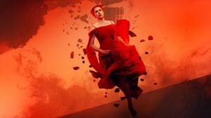 A person wearing a red dress runs from a falling building in a promotional image for English Touring Opera's Tosca.